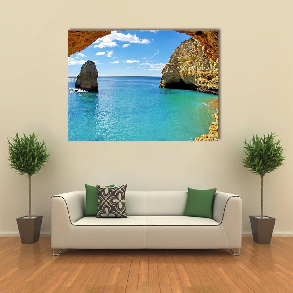 Rock Formations on Algarve Coast Canvas Wall Art in beige, brown and blue, single panel hung on a wall