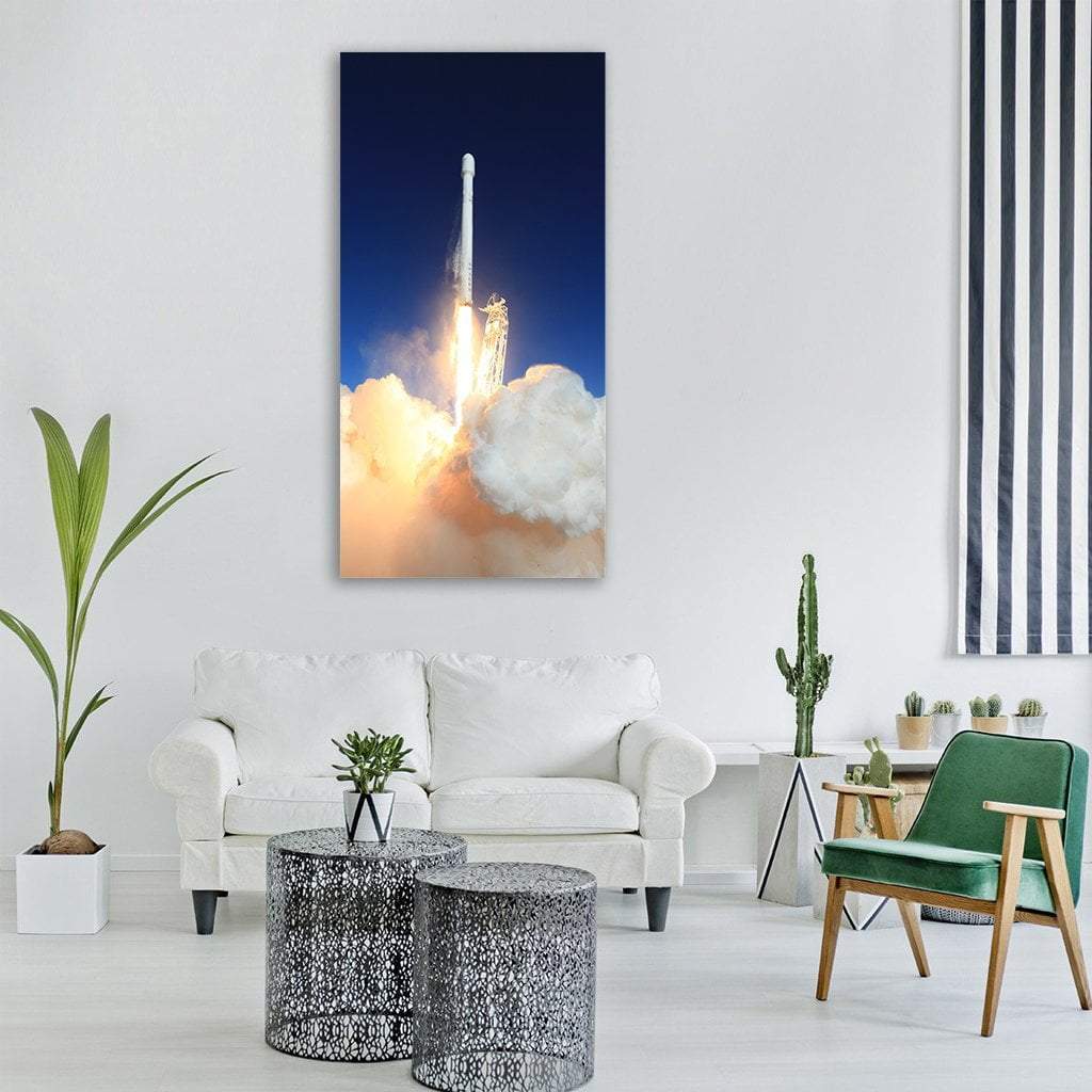 Rocket Launch at Twilight Vertical Canvas Wall Art in white, orange and blue, single vertical panel hung on a wall