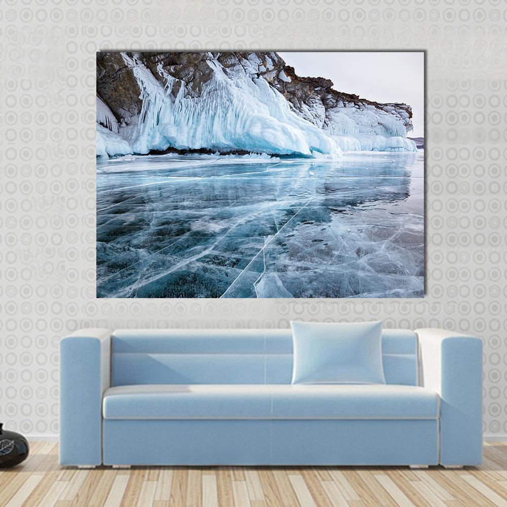 Frozen Rocks in Siberian Baikal Lake Canvas Wall Art in white, brown and blue, single panel hung on a wall