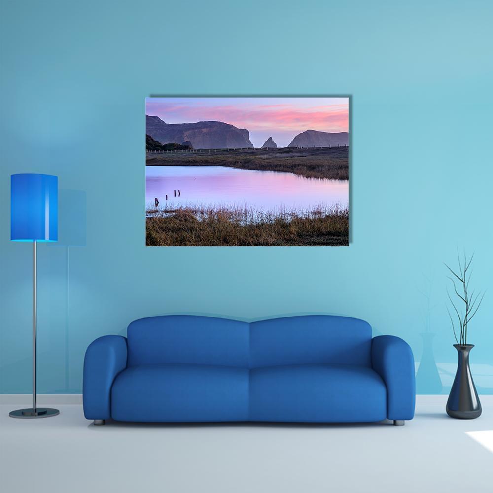 Rodeo Lagoon at Dusk Canvas Wall Art in blue, purple and pink, single panel hung on a wall