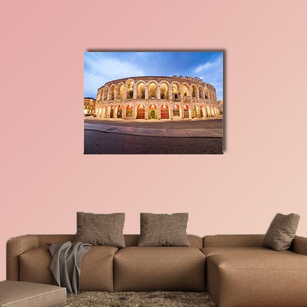 Roman Arena in Verona at Dusk Canvas Wall Art in beige, orange and blue, single panel hung on a wall