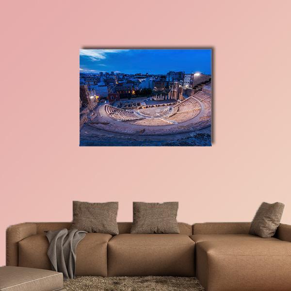 Roman Theatre in Cartagena at Dusk Canvas Wall Art in brown, gold and blue, single panel hung on a wall