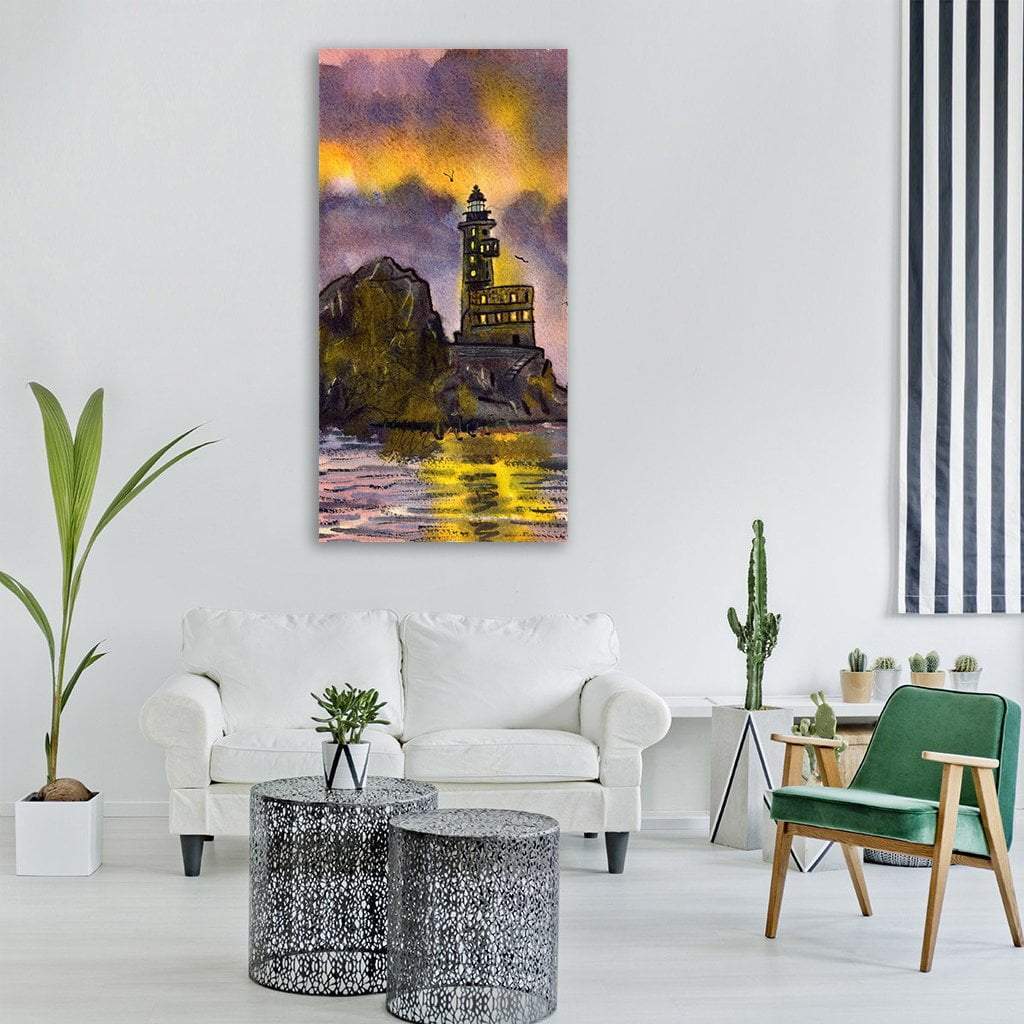 Romantic Lighthouse at Sunset Vertical Canvas Wall Art in orange, yellow and purple, single vertical panel hung on a wall