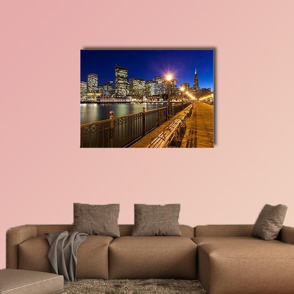 San Francisco Pier 7 Night View Canvas Wall Art in black, yellow and blue, single panel hung on a wall