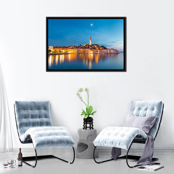 Rovinj Dusk Skyline with Church Tower Canvas Wall Art in orange, yellow and blue, framed canvas, product view on a white background