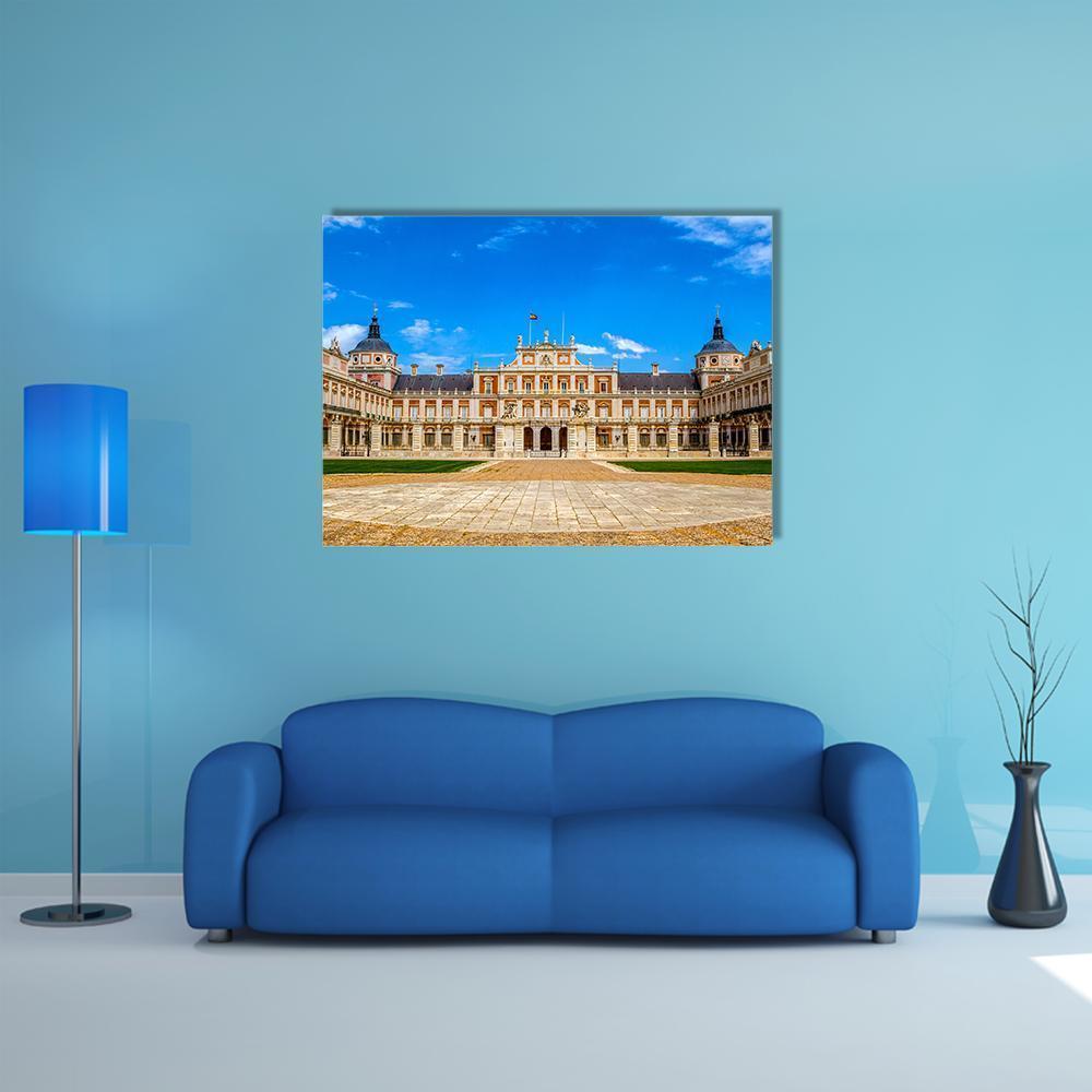 Royal Palace Stone Courtyard Canvas Wall Art in beige, brown and blue, single panel hung on a wall