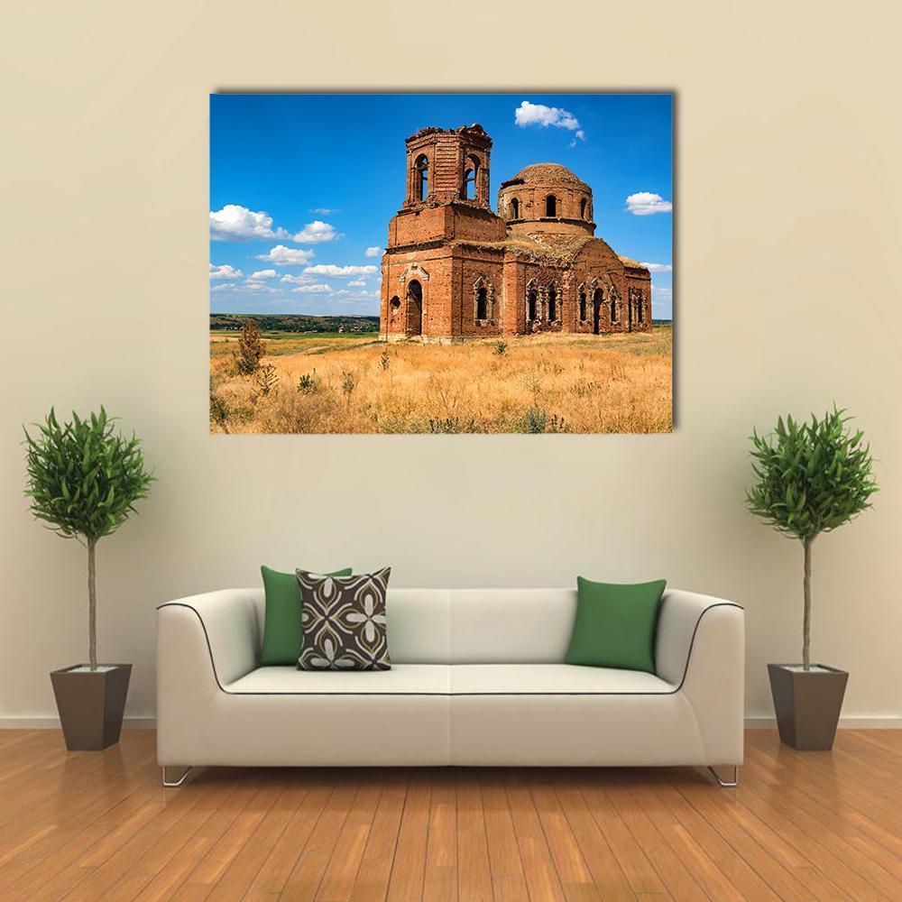 Ruined Orthodox Cathedral Canvas Wall Art in brown, orange and blue, single panel hung on a wall