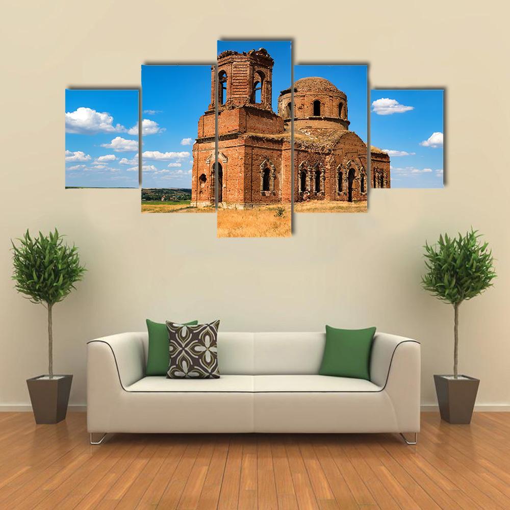 Ruined Orthodox Cathedral Canvas Wall Art in brown, orange and blue, 5 panel Star layout hung on a wall
