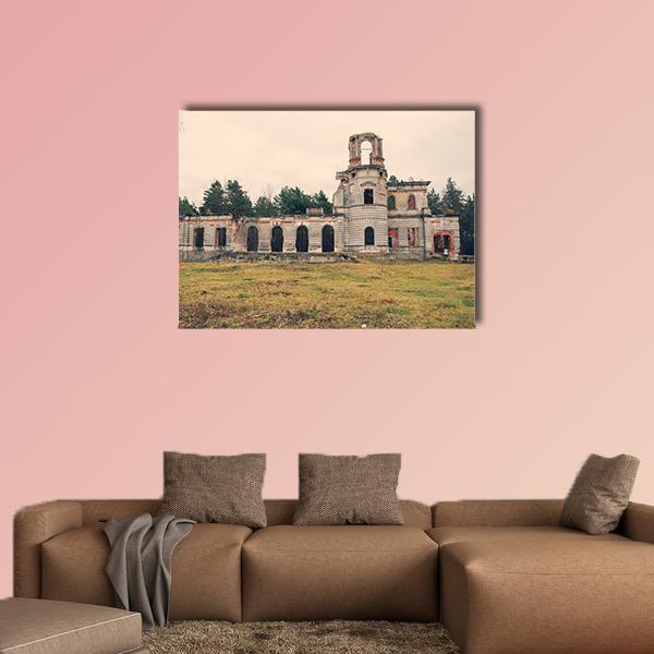 Ruined Castle with Tower and Arches Canvas Wall Art in gray, beige and green, single panel hung on a wall