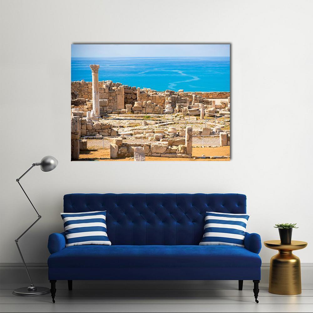 Ancient Kourion Ruins by the Sea Canvas Wall Art in beige, brown and blue, single panel hung on a wall