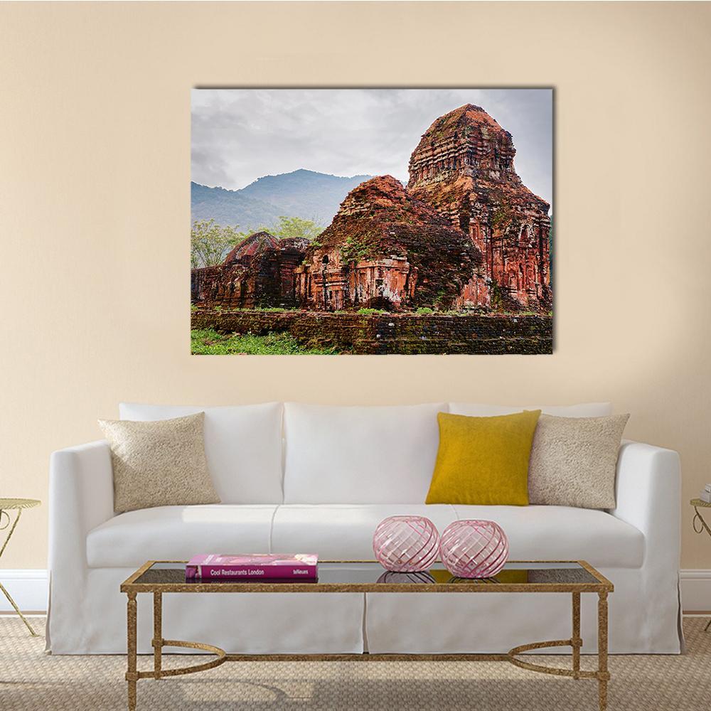Old Hindu Temple Ruins Canvas Wall Art in gray, brown and green, single panel hung on a wall