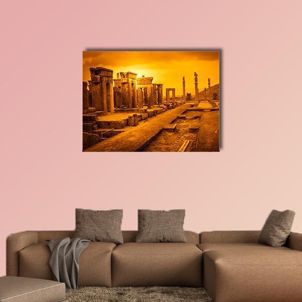 Persepolis Ruins at Sunset Canvas Wall Art in brown, orange and yellow, single panel hung on a wall