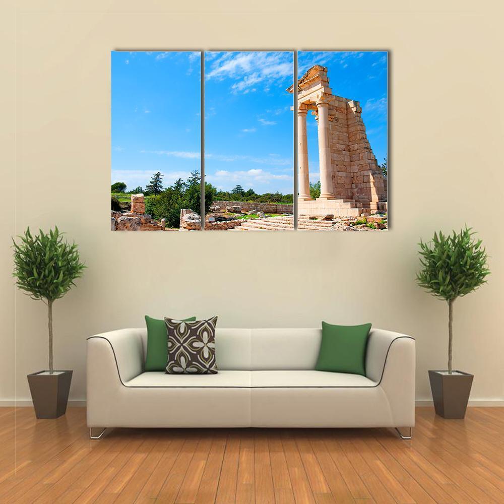 Ruins of the Sanctuary of Apollo Hylates Canvas Wall Art in beige, brown and blue, 3 panel horizontal set hung on a wall