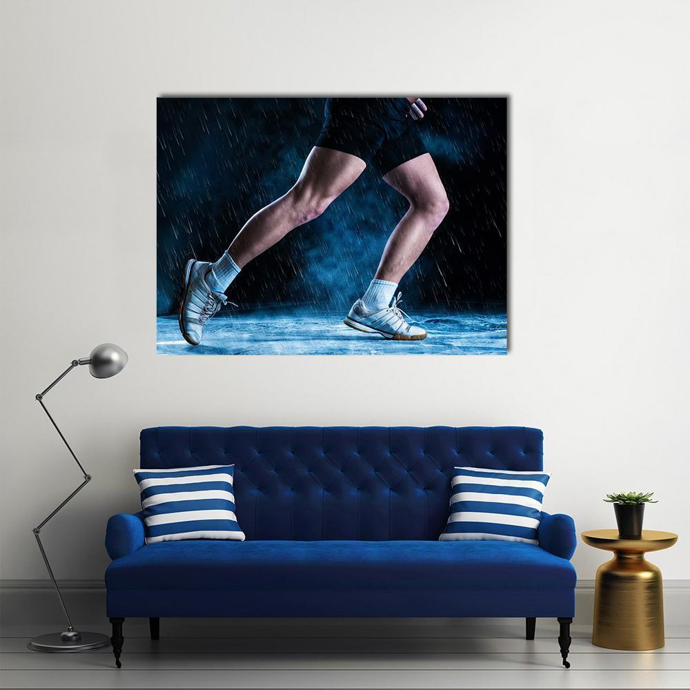 Athletic Feet Running in Rain Canvas Wall Art in black and blue, single panel hung on a wall