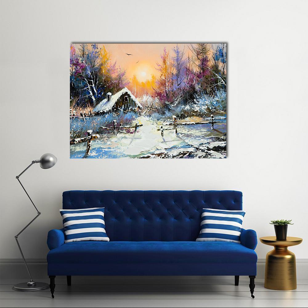 Snow-covered Cottage at Sunset Canvas Wall Art in white, orange and blue, single panel hung on a wall