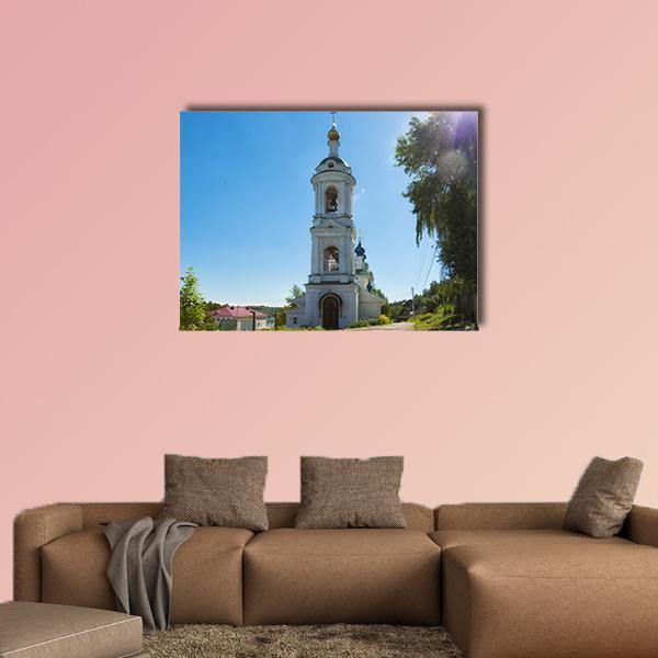 St. Varvara Church in Ples Canvas Wall Art in white, green and blue, single panel hung on a wall