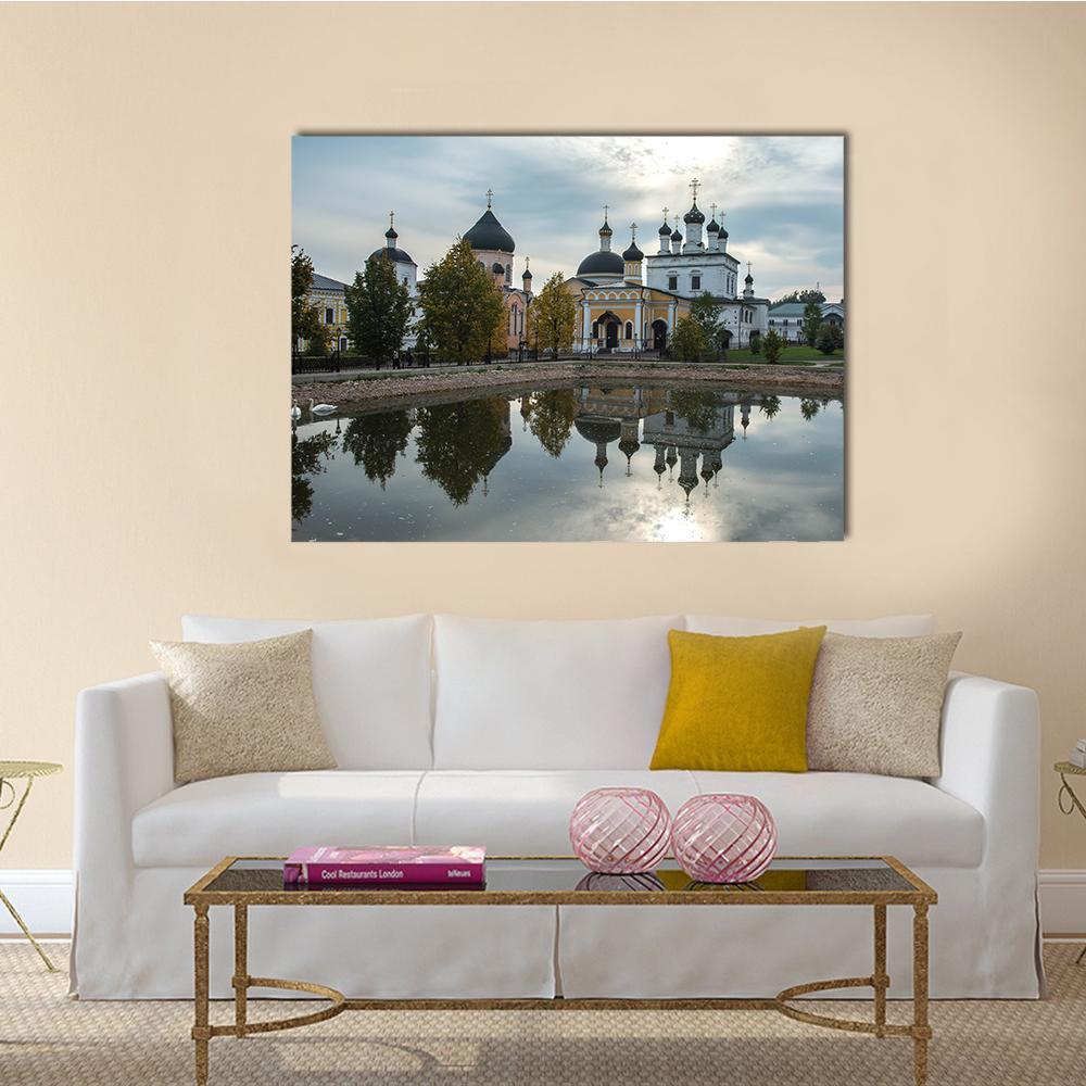 Russian Orthodox Church with Pond Reflection Canvas Wall Art in white, gray and blue, single panel hung on a wall