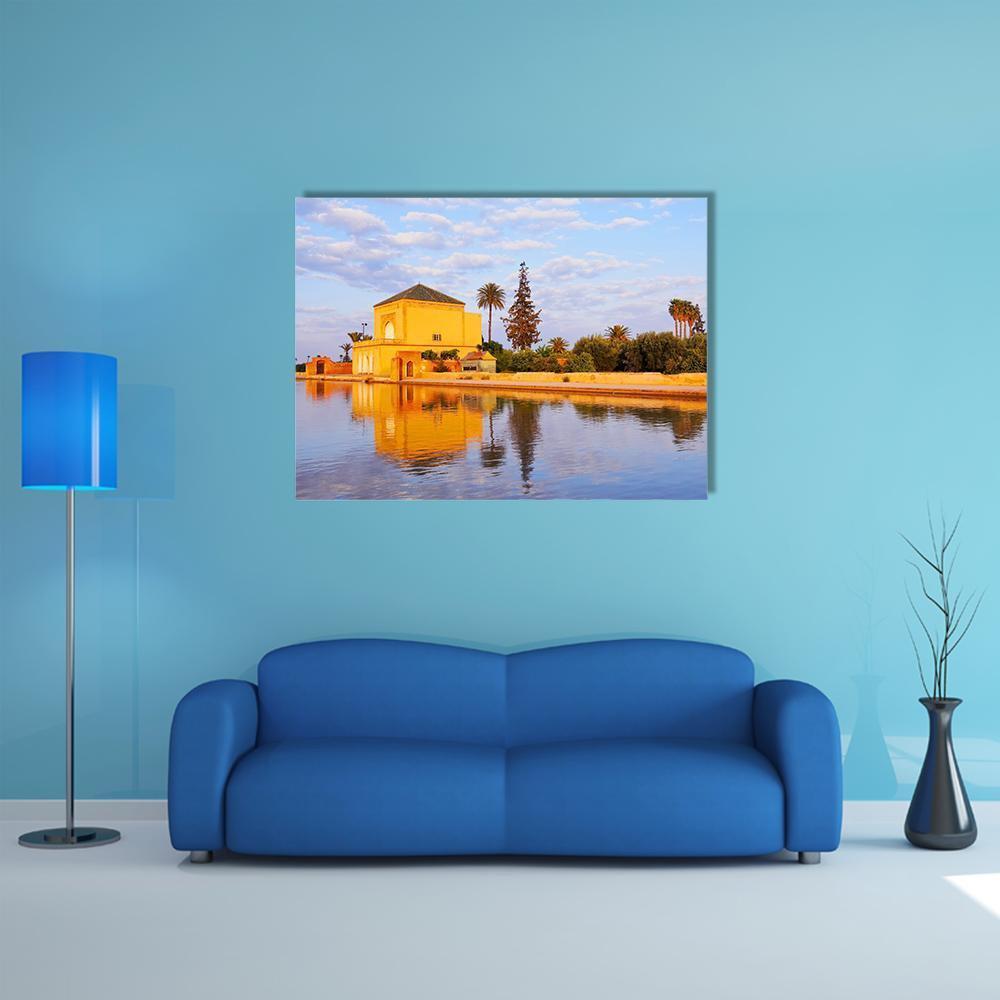 Saadian Garden in Morocco Canvas Wall Art in orange, yellow and blue, single panel hung on a wall