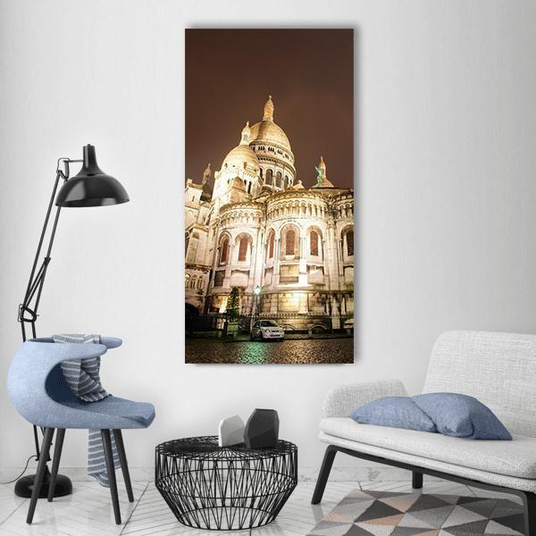 Sacré-cœur Basilica, Paris Vertical Canvas Wall Art in beige, brown and yellow, hung on a wall