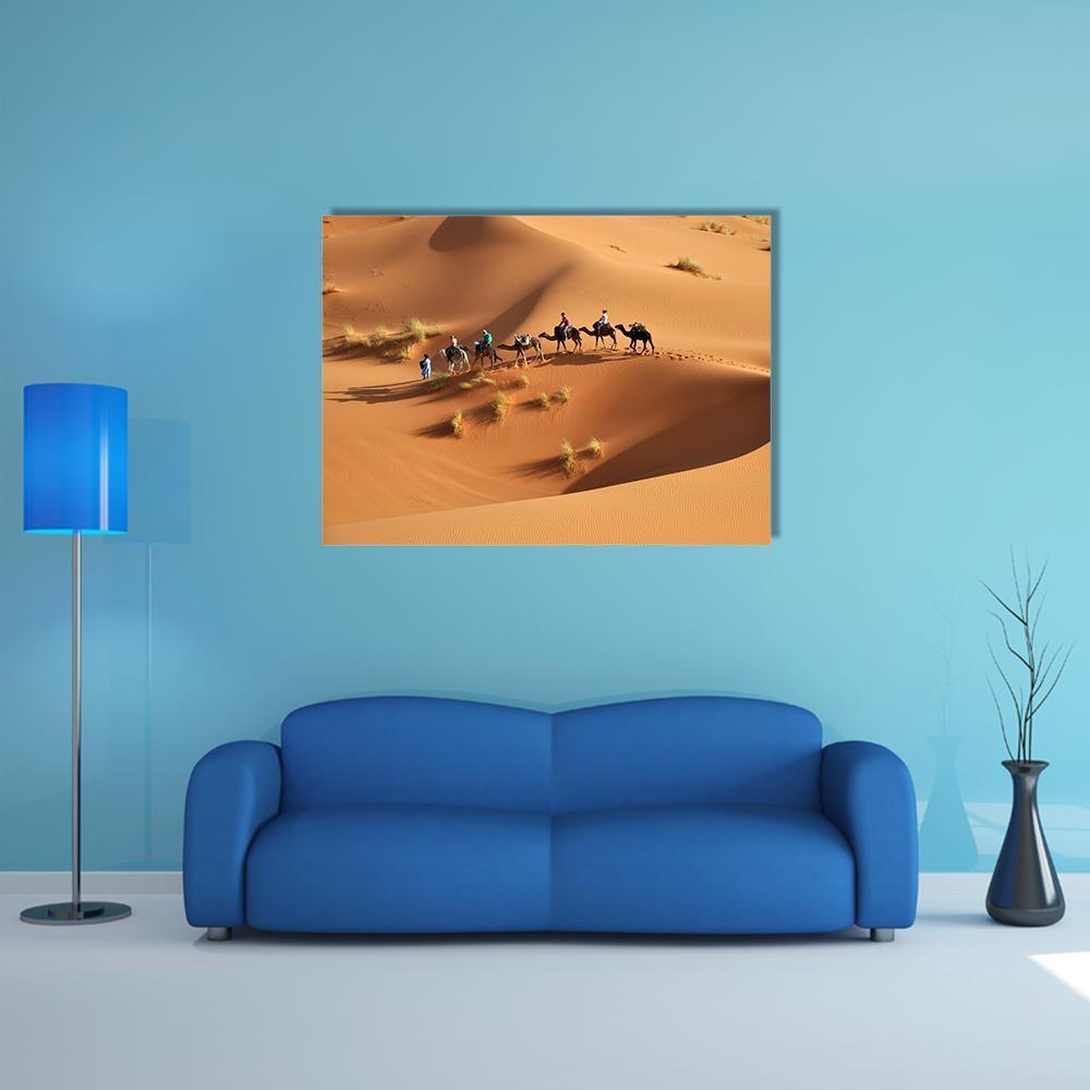 Camels in the Sahara Desert, Morocco Canvas Wall Art in beige, brown and orange, single panel hung on a wall
