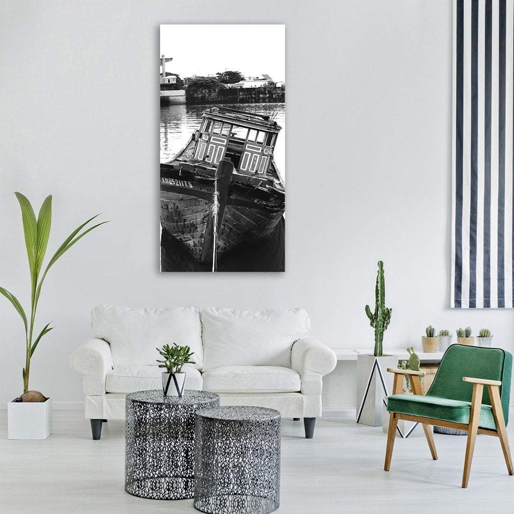 Vintage Sail Boat in Vietnam Vertical Canvas Wall Art in black, white and gray, single vertical panel hung on a wall
