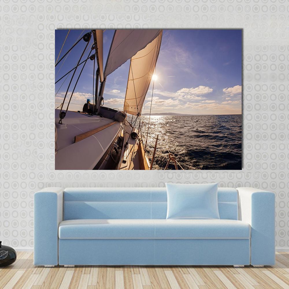 Sailing Boat Wide Angle View in the Sea Canvas Wall Art in white, beige and blue, single panel hung on a wall