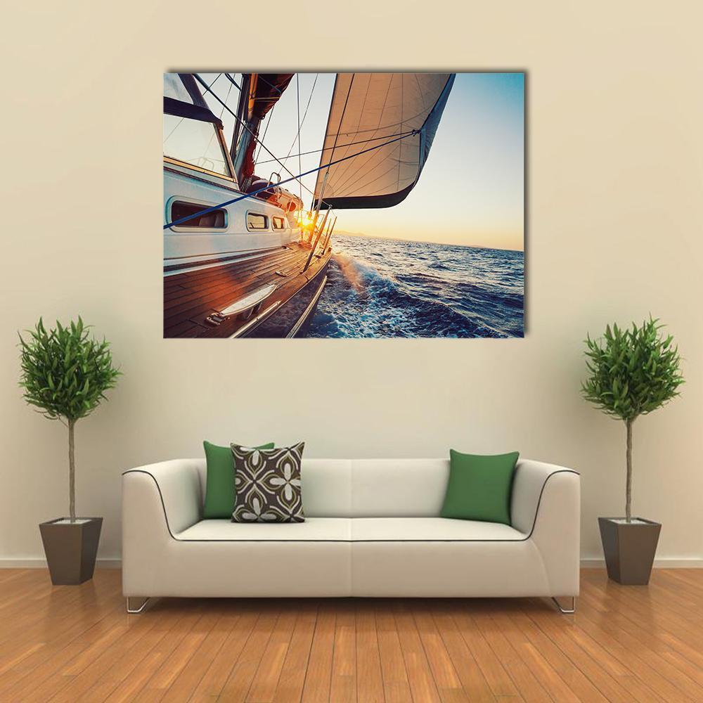 Sailing Into the Sunset Canvas Wall Art in white, orange and blue, single panel hung on a wall