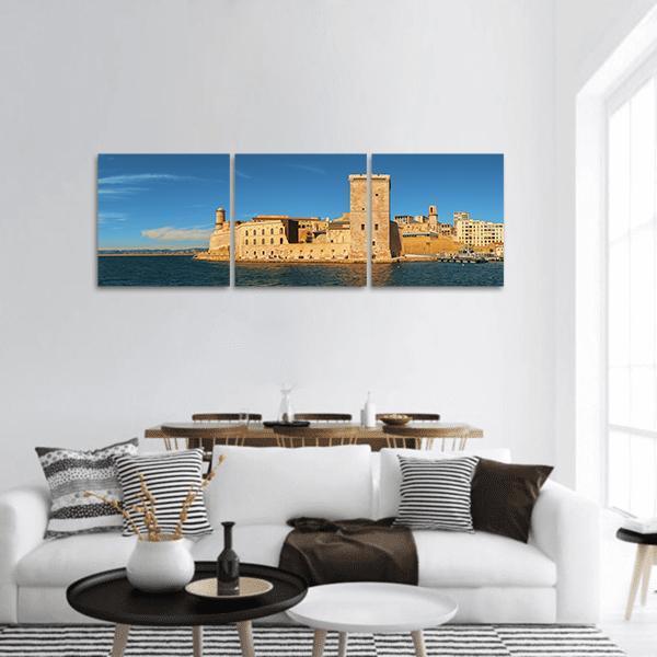 Saint Jean Fort Coastal Fortress Panoramic Canvas Wall Art in beige, brown and blue, hung on a wall