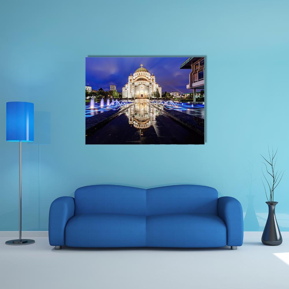 Temple of Saint Sava with Fountain Canvas Wall Art in black, gold and blue, single panel hung on a wall