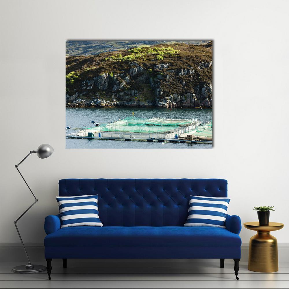 Salmon Farm on Rocky Loch Canvas Wall Art in brown, green and blue, single panel hung on a wall