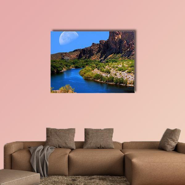 Salt River with Crescent Moon Canvas Wall Art in brown, green and blue, single panel hung on a wall