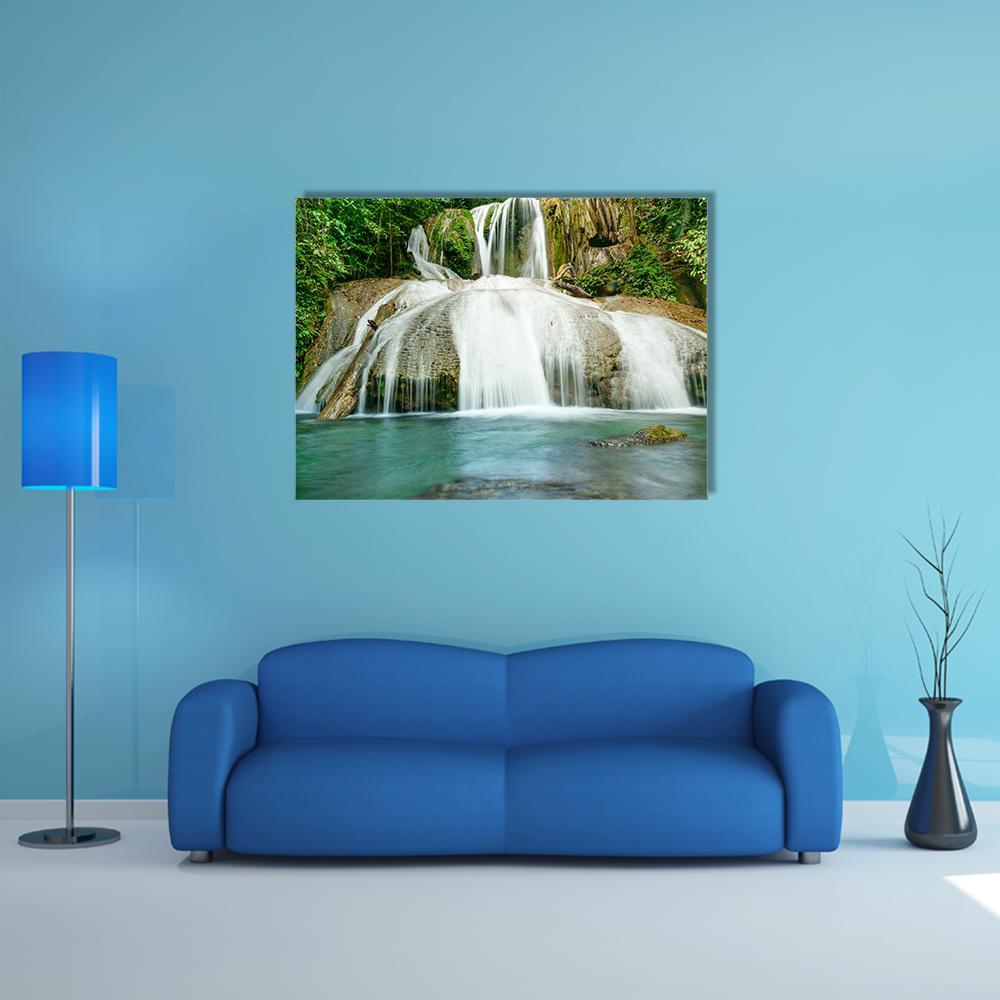 Saluopa Waterfall in Tentena, Indonesia Canvas Wall Art in white, brown and green, single panel hung on a wall