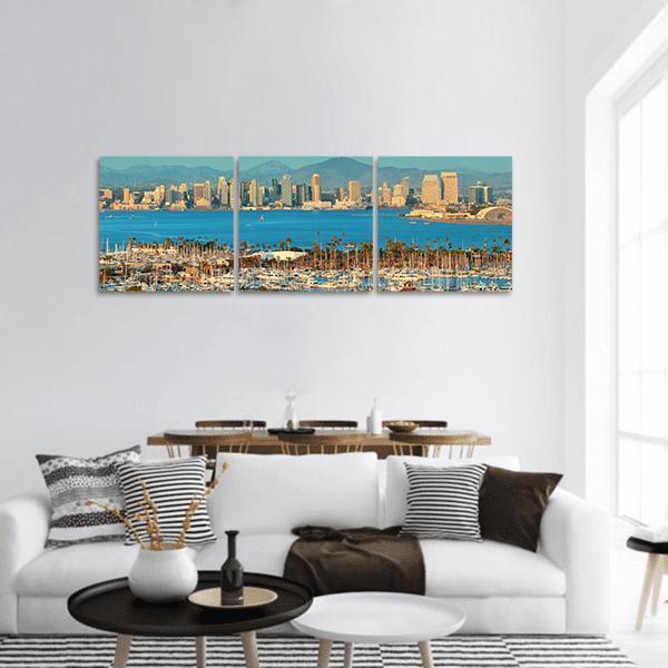 San Diego Skyline Panoramic Canvas Wall Art in beige and blue, hung on a wall
