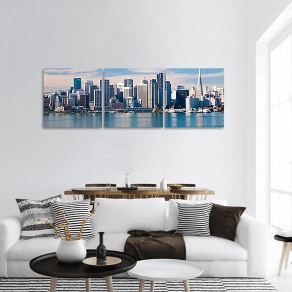 San Francisco Skyline with Transamerica Pyramid Panoramic Canvas Wall Art in white, gray and blue, hung on a wall