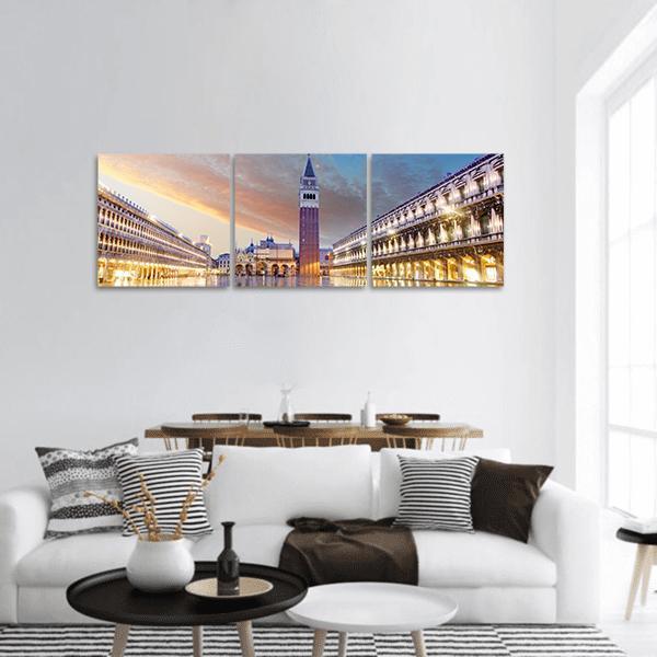 San Marco Square at Dusk, Venice Panoramic Canvas Wall Art in orange, yellow and blue, hung on a wall