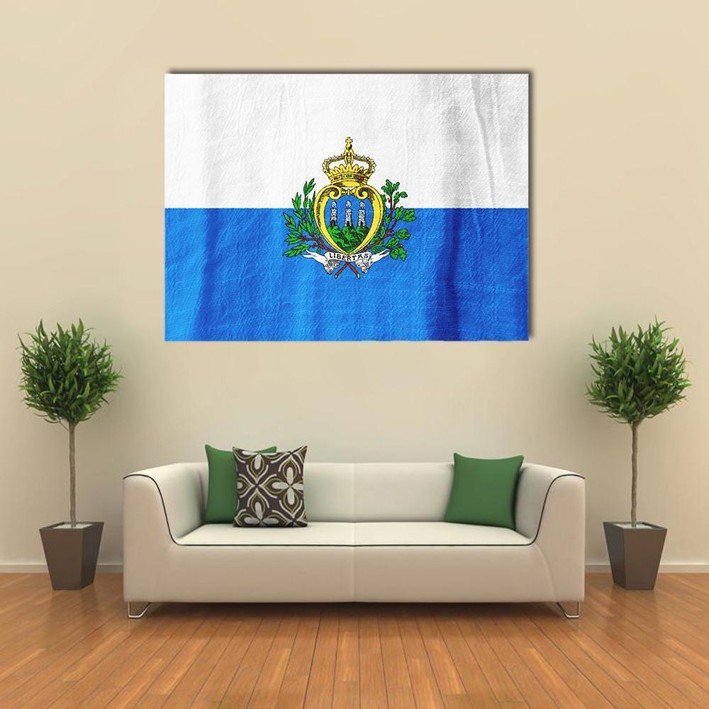 San Marino Flag with Coat of Arms Canvas Wall Art in white and blue, single panel hung on a wall