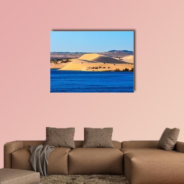 Vietnam Sand Dunes at Sunset Canvas Wall Art in beige, yellow and blue, single panel hung on a wall