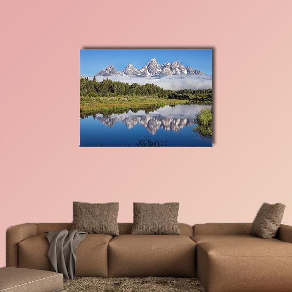 Sank River Reflections Canvas Wall Art in white, green and blue, single panel hung on a wall