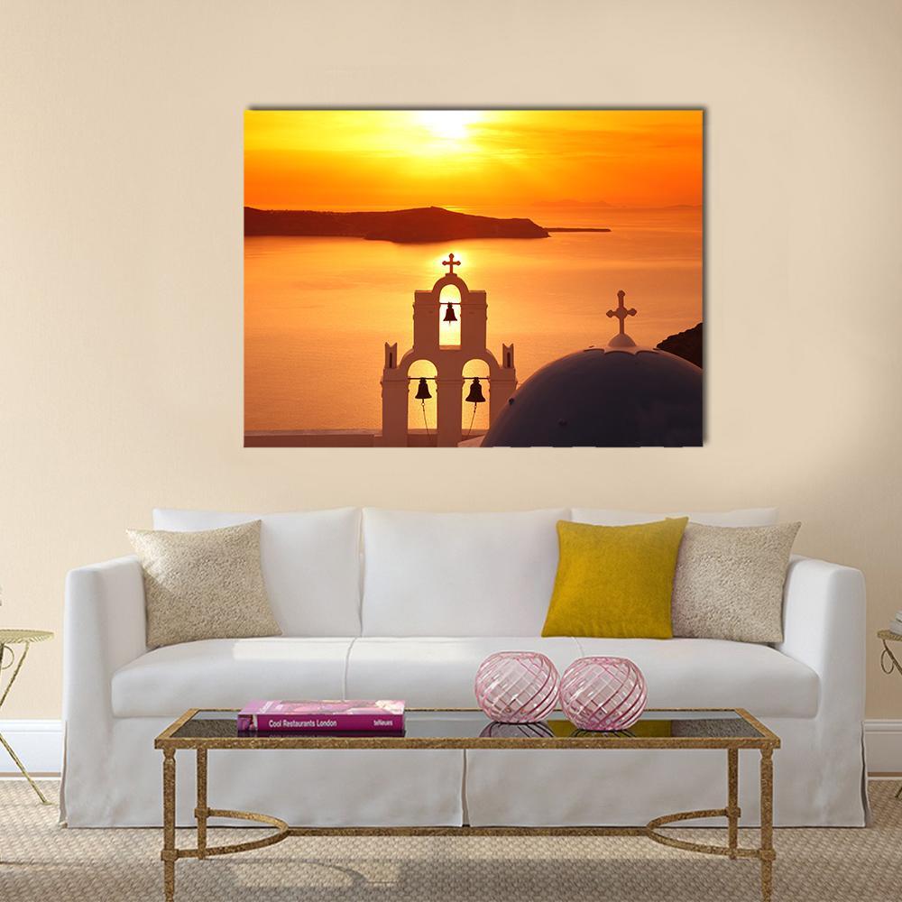 Santorini Sunset with Firostefani Church Canvas Wall Art in orange and yellow, single panel hung on a wall