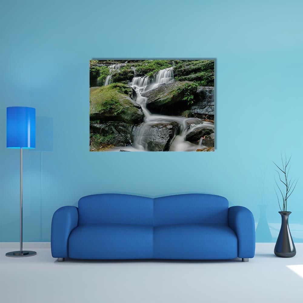 Sarai Berunyau Waterfall Canvas Wall Art in white, gray and green, single panel hung on a wall