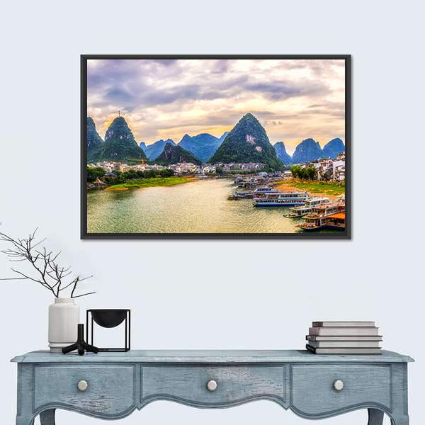 Karst Mountains and River at Sunset Canvas Wall Art in yellow, green and blue, framed canvas, product view on a white background