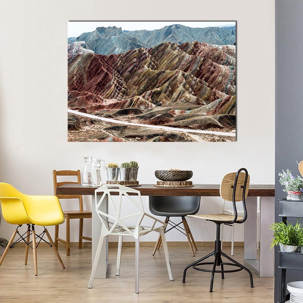 Rainbow Mountains of Zhangye Canvas Wall Art in brown, red and multicolor, single panel hung on a wall