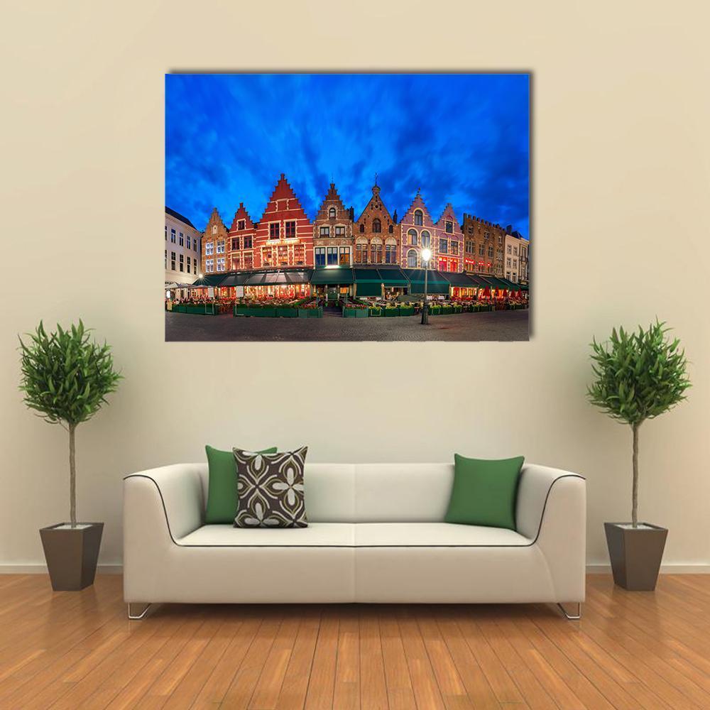Medieval Fairytale Town at Night Canvas Wall Art in brown, red and blue, single panel hung on a wall