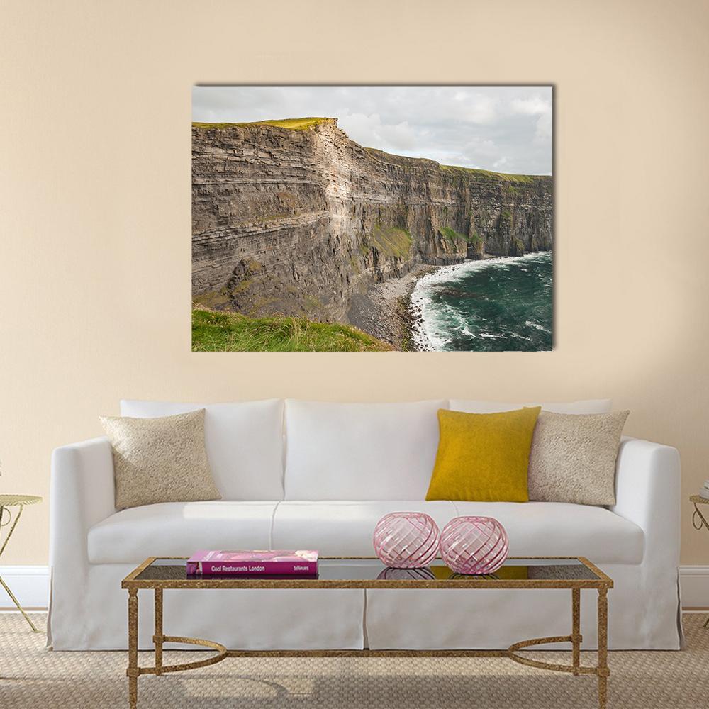 Dramatic Cliffs of Moher Landscape Canvas Wall Art in gray, green and blue, single panel hung on a wall