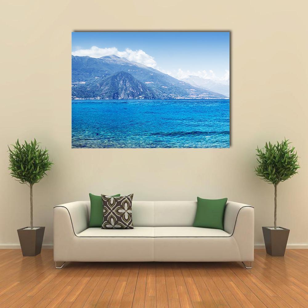 Lake Como Landscape Canvas Wall Art in white and blue, single panel hung on a wall