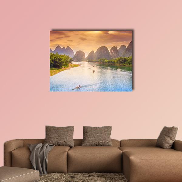 Guilin Karst River at Sunset Canvas Wall Art in orange, yellow and blue, single panel hung on a wall