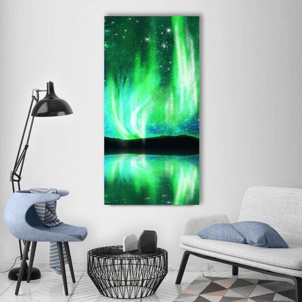 Aurora Borealis Over Mountain Reflection Vertical Canvas Wall Art in black, green and blue, single vertical panel hung on a wall