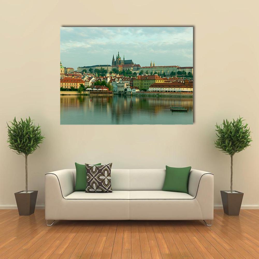 Prague Castle Over the Vltava River Canvas Wall Art in brown, green and blue, single panel hung on a wall