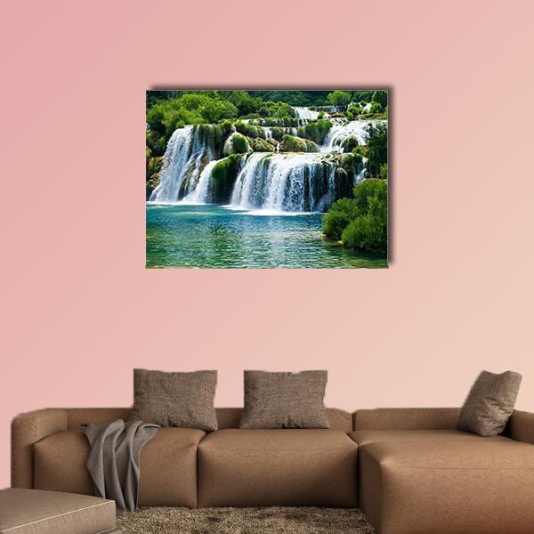 Tiered Waterfalls Over Emerald Pool Canvas Wall Art in white, green and blue, single panel hung on a wall