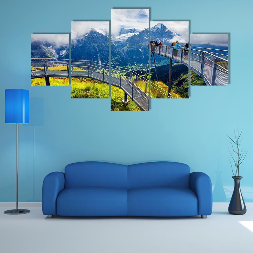 Schreckhorn Mountain in Morning Mist Canvas Wall Art in white, green and blue, 5 panel Star layout hung on a wall